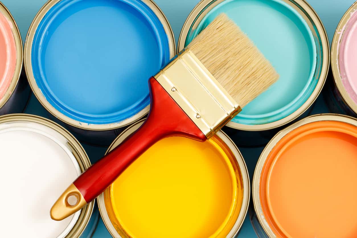 cans of paint for interior painting repairs